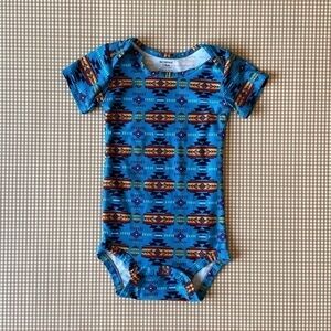 Tribal print stretchy onesie. Size 18 Months